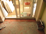 SX18803 Hole by conservatory tiled over.jpg